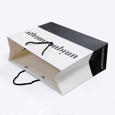 Accessori a nastro Borsa di carta con logo personalizzato per la vendita al dettaglio Borse per imballaggio regalo