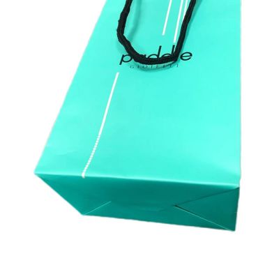 Sacchetto regalo di carta verde matto di lusso per l' imballaggio dei vestiti