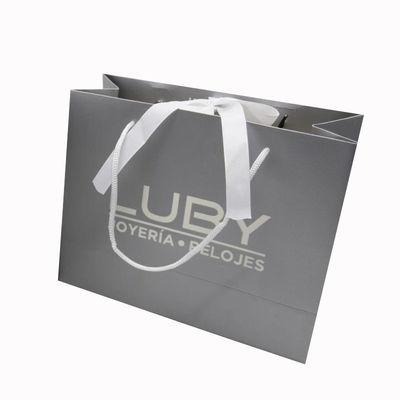 Stampaggio a caldo Borse regalo di lusso personalizzate Borse per lo shopping Kraft riciclabili con maniglie