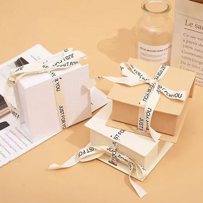 Logo a nastro bianco scatola regalo pieghevole trucco abbigliamento accessori cartone rigido con laminazione lucida