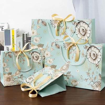 Sacchetto di carta personalizzato all'ingrosso Eco Shopping Packaging Gift Bag Sacchetto di carta stampato con il tuo logo