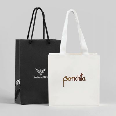 Indumenti di lusso Borse da shopping in carta Borse regalo bianche con maniglie a nastro